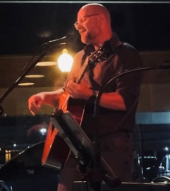Phillip performing at an indoor venue