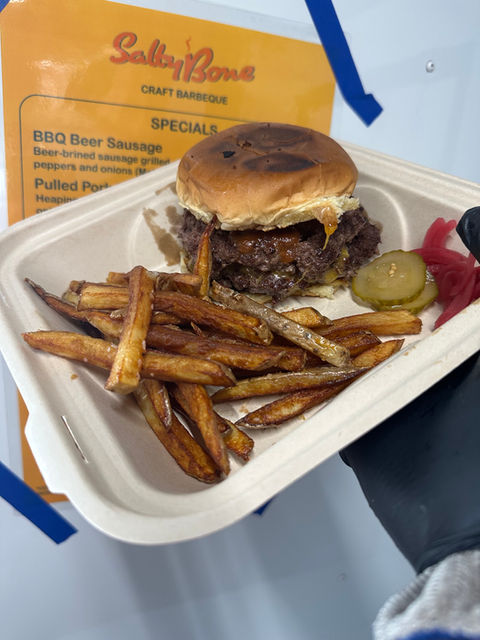 Juicy smash burger, hand-cut fries, pickles, BBQ sauce in container