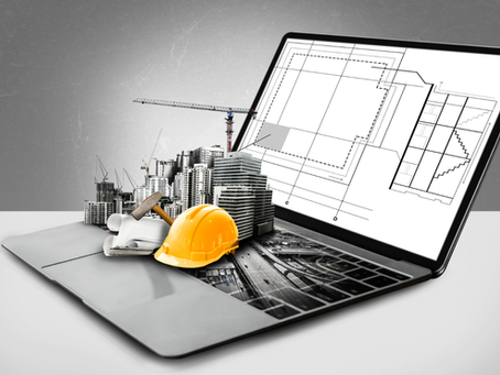Computador exibindo modelo digital de engenharia com capacete, prédios e planta estrutural, representando a modelagem de corredores no Civil 3D para projetos lineares.