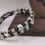 Thumbnail: Braided Leather Skull Guitar String Bracelet 