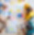 people collaborating over bright table with design and marketing elements