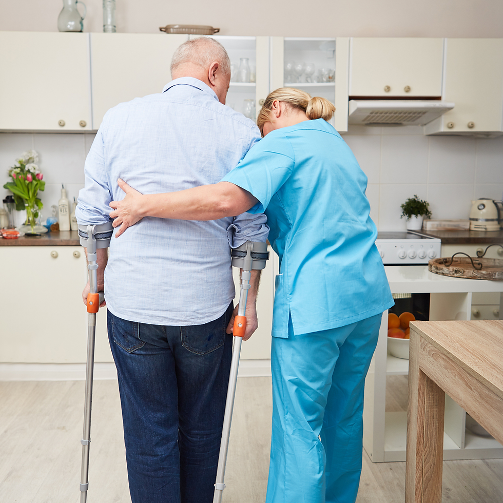 Female nurse helps man on crutches