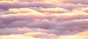Warm-lit clouds in purple and gold