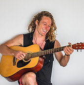 John - Guitar Laughing Horizon.jpg