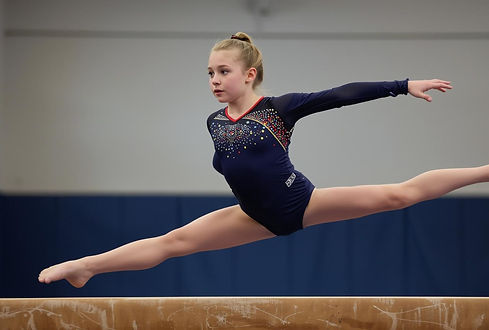 12 year old girl on a balance beam doing a routine_edited.jpg