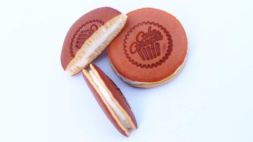 Top and cut view of a milkburger by Cake Concepts.