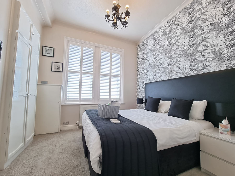 Modern bedroom in a dog friendly accommodation.