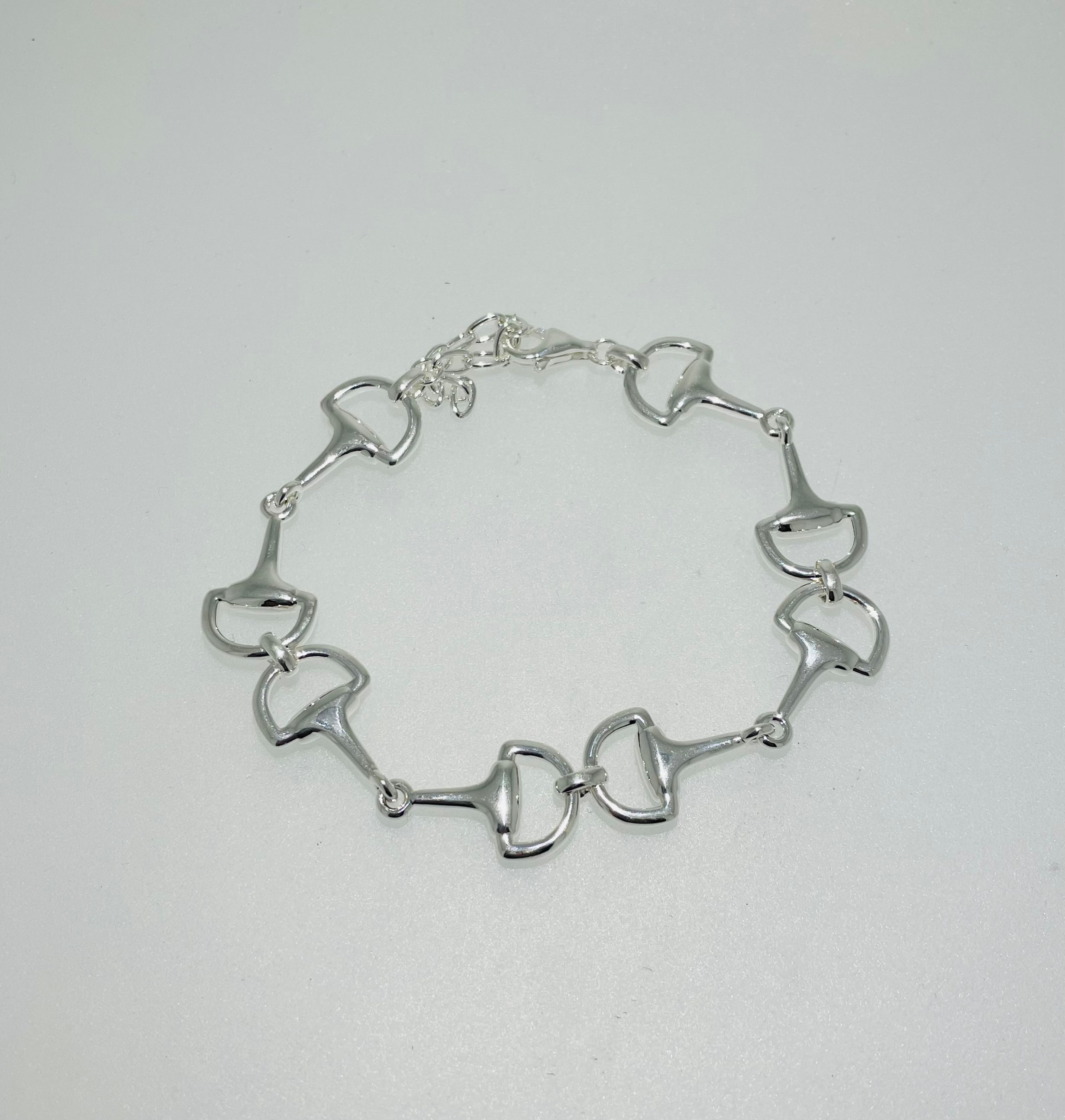 Silver multi snaffle bracelet