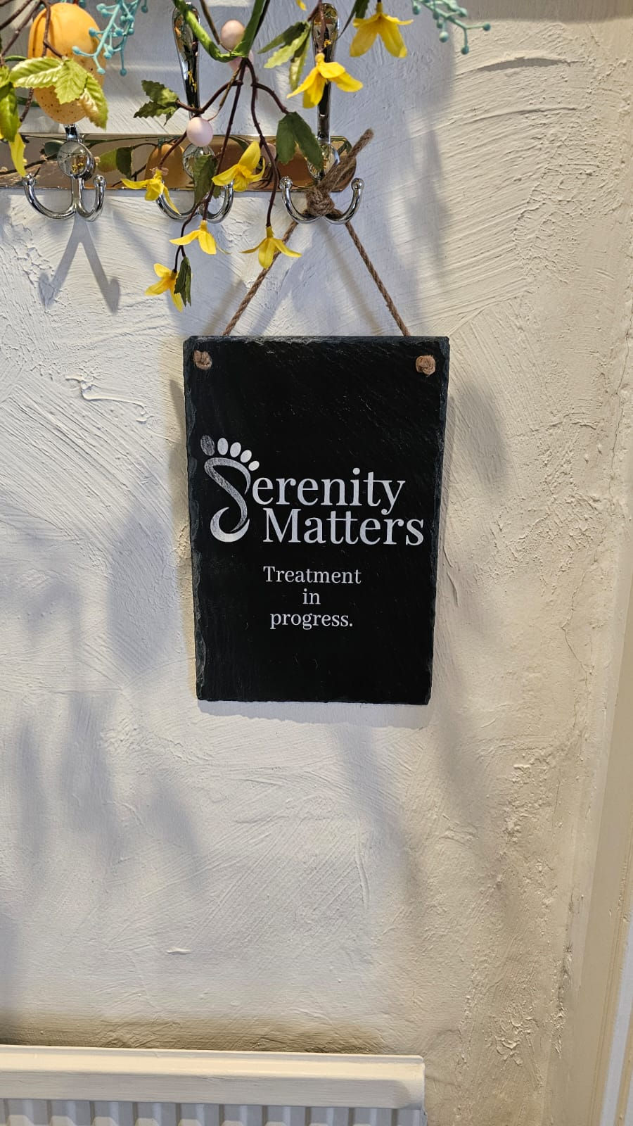 Alternative therapies clinic, double sided sign for please wait or come in...