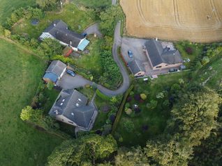 Aerial View of Home in countryside with Heat Pump