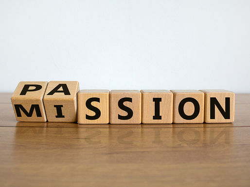 Flipped wooden cubes that spell out MISSION turning into PASSION.