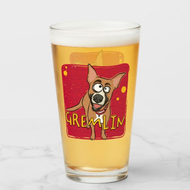 A pint glass featuring an intentionally bad doodle of an adorable dog.