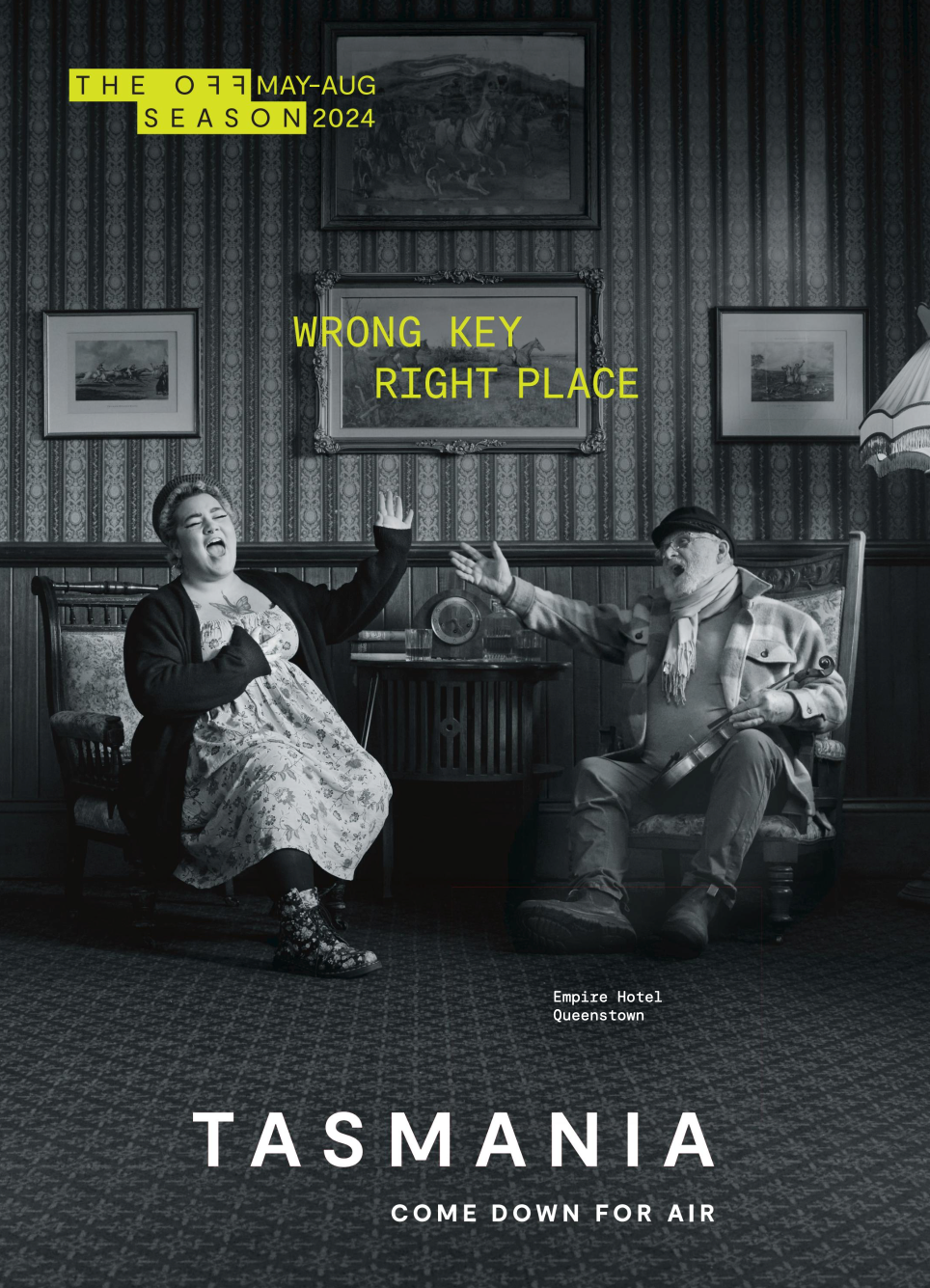 A funny image of two people singing in the dining room of The Empire Hotel, Queenstown.