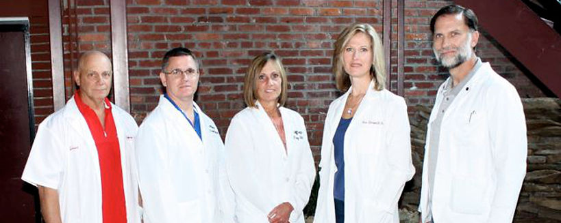 Jefferys Drugstore Pharmacists standing in front of store.
