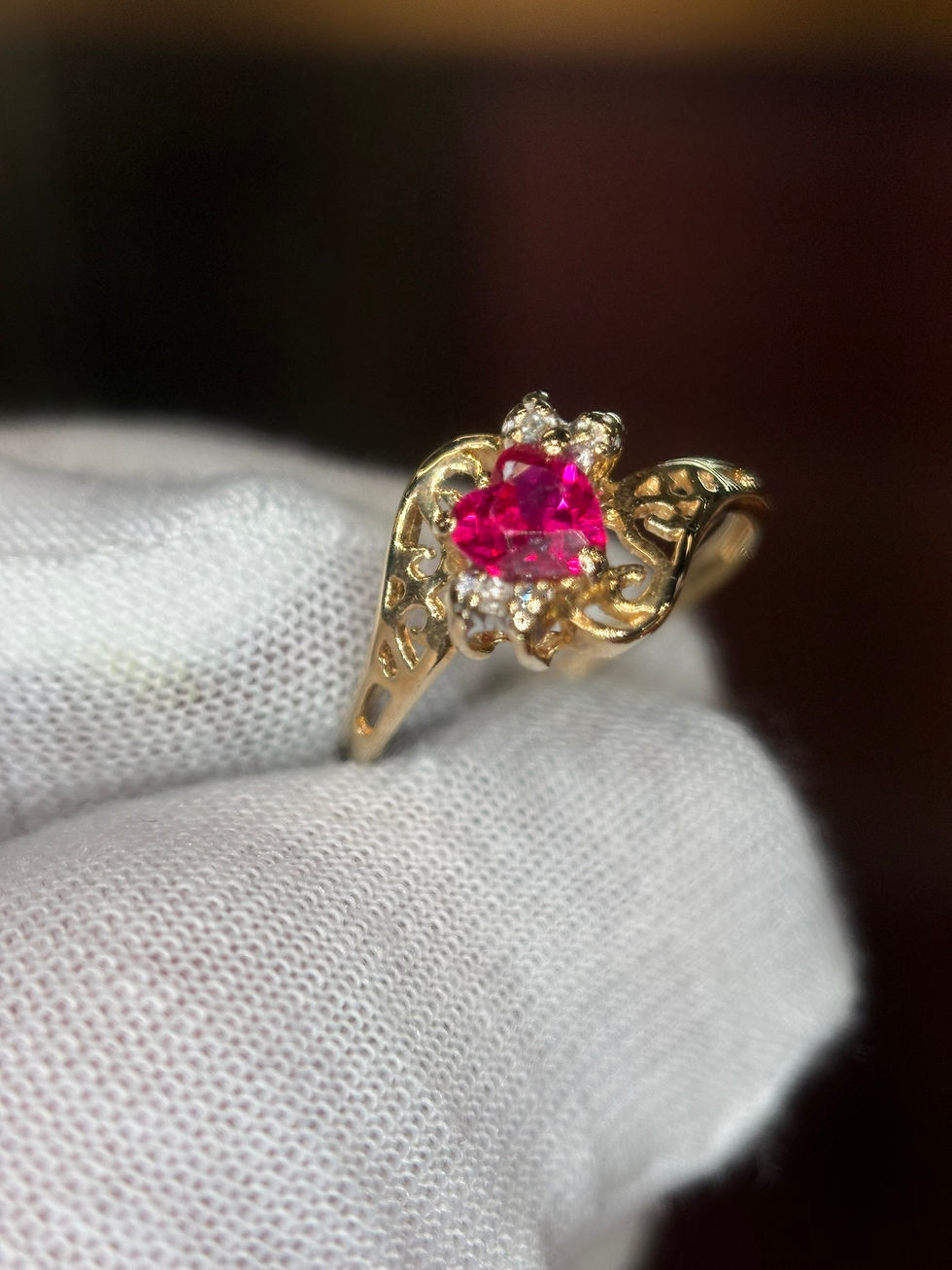 Thumbnail: Heart-shaped pink gemstone ring in yellow gold setting