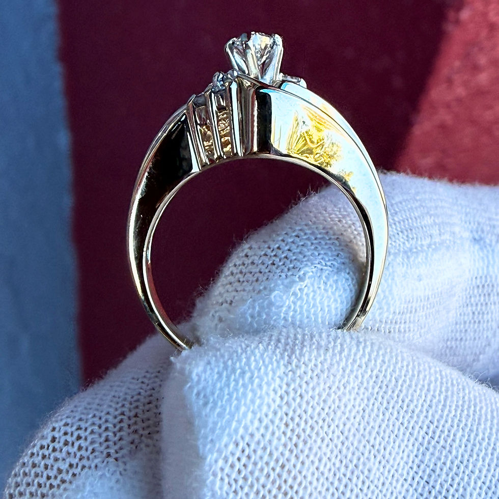 Thumbnail: End view of the marquise diamond ring showing the band and prong setting