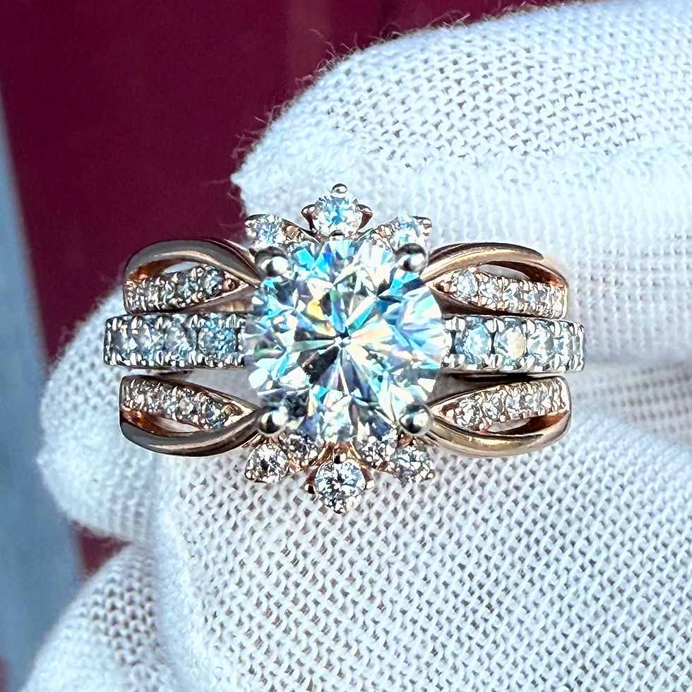 Top view of a 2.50cttw natural diamond wedding set, 1.50ct round center in 14K white gold inside a 14K rose gold jacket