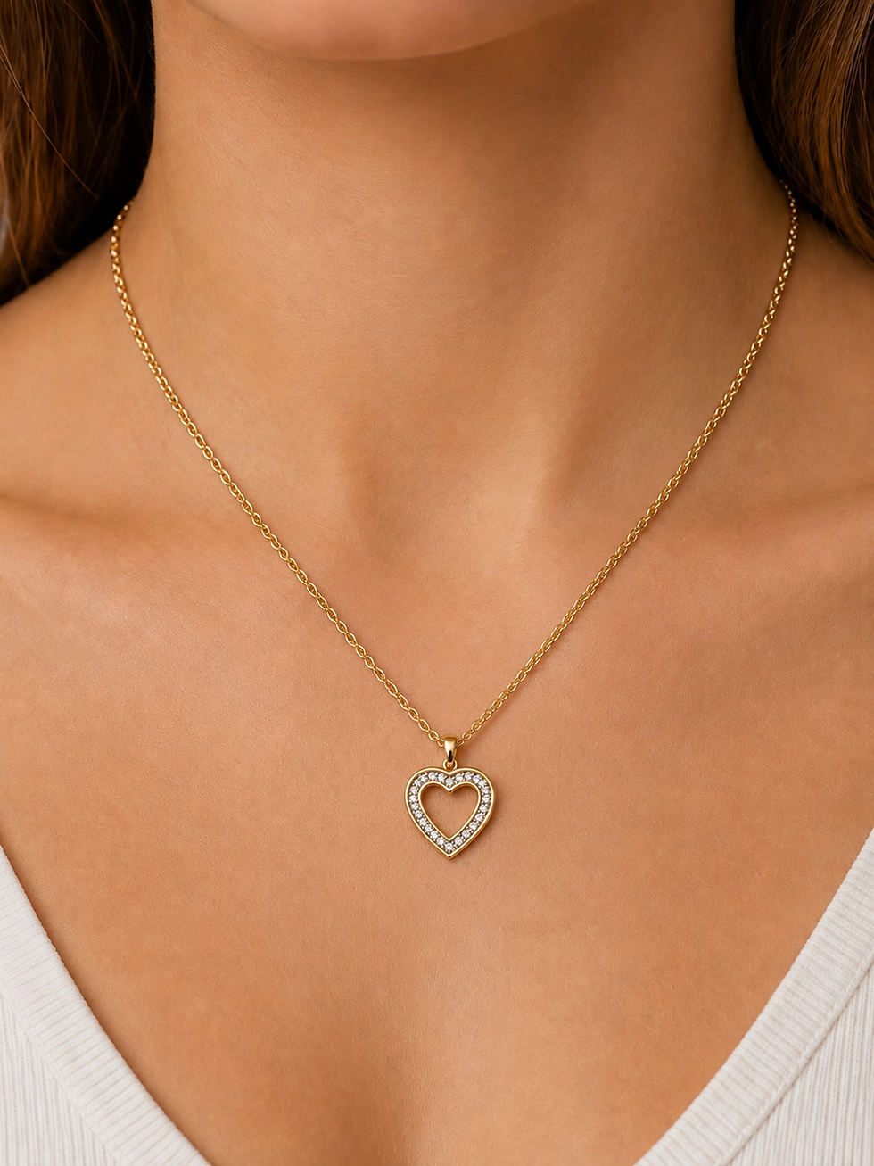 Thumbnail: Gold heart pendant necklace with diamonds on a woman's neck