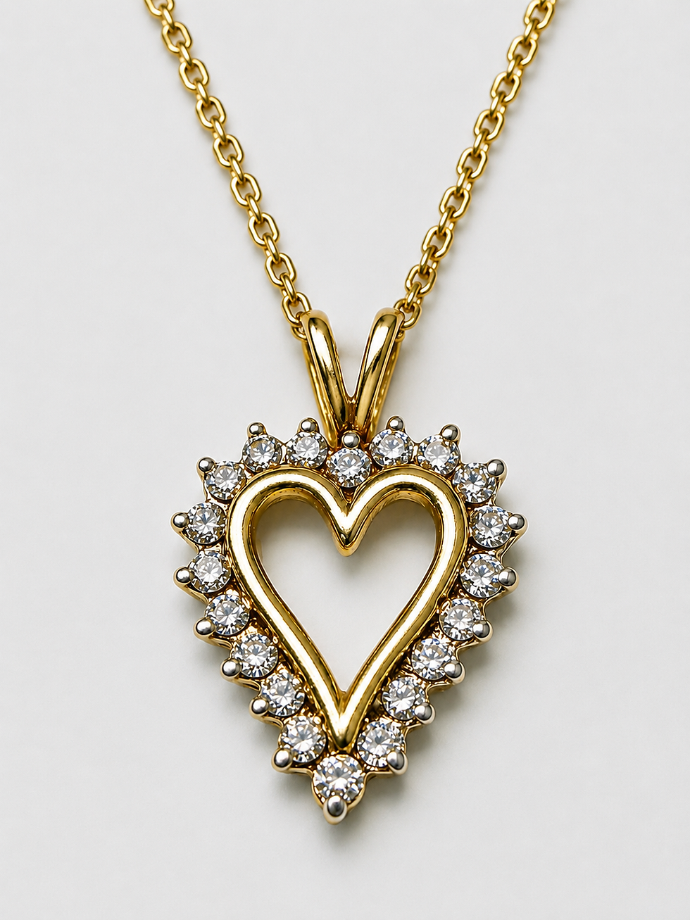 Gold heart pendant necklace with diamond halo