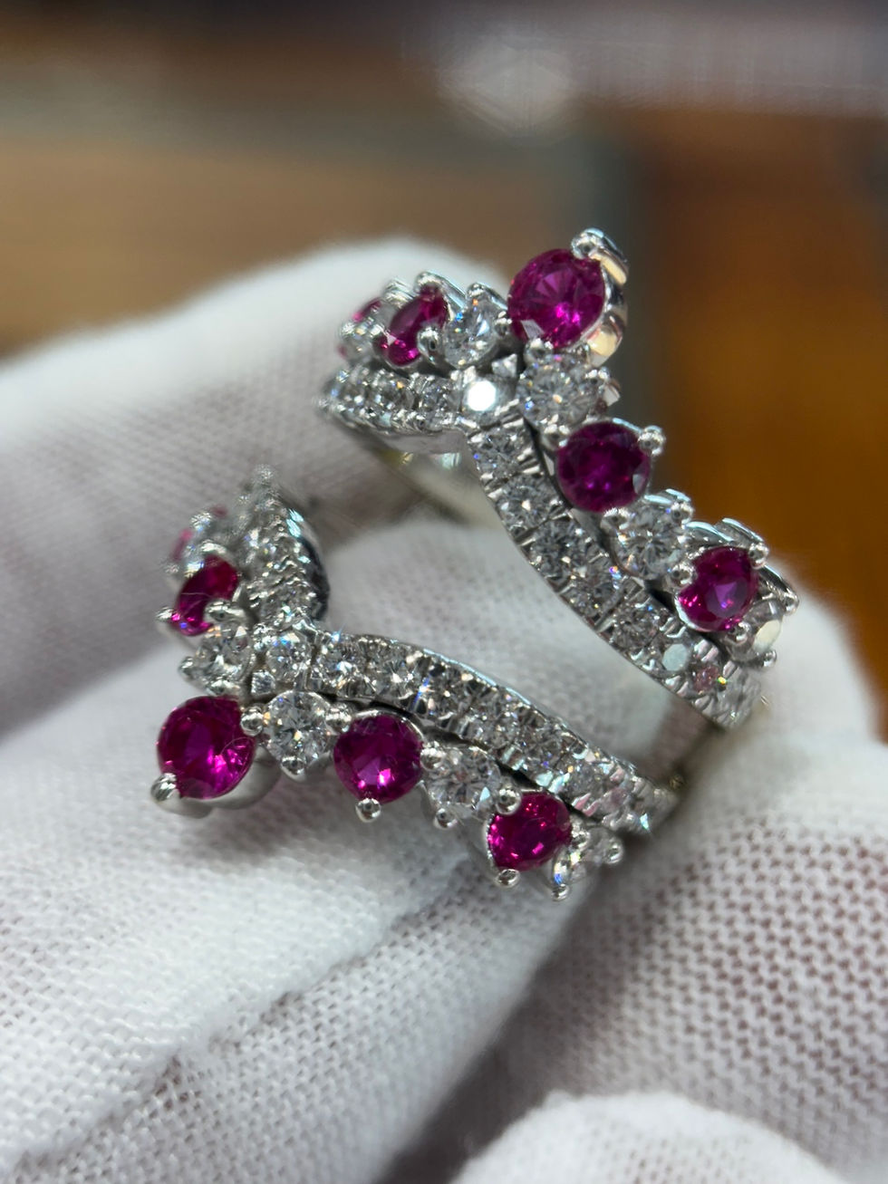 Thumbnail: 2.87ct natural garnet and diamond ring set held in gloved hands