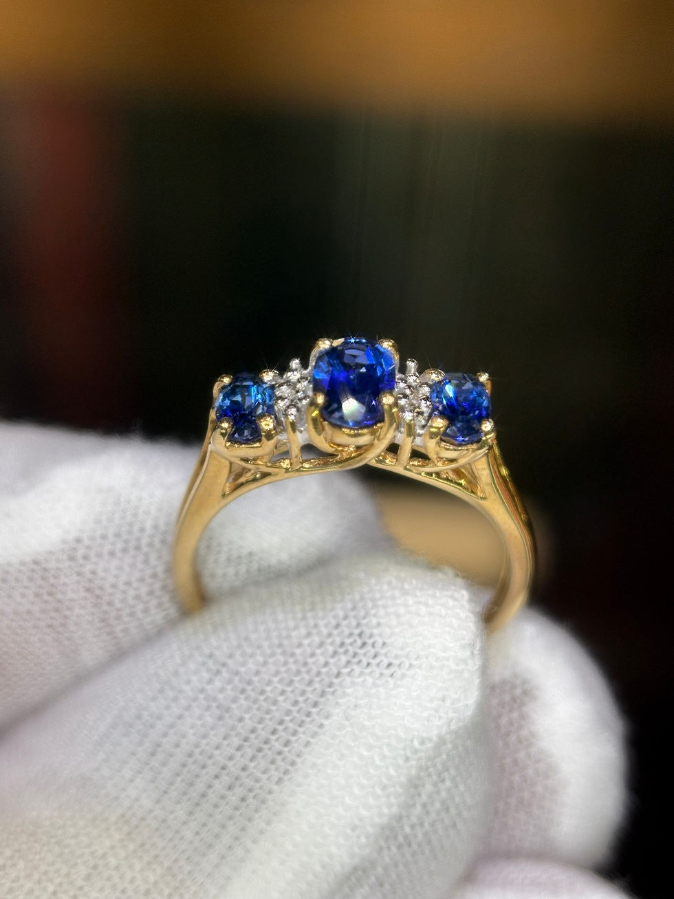 Thumbnail: Blue sapphire and diamond cluster ring in 10K gold.