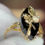 Thumbnail: Black Onyx Marquise Ring with Diamond Accent | 10K Yellow Gold | Leaf & Flower D