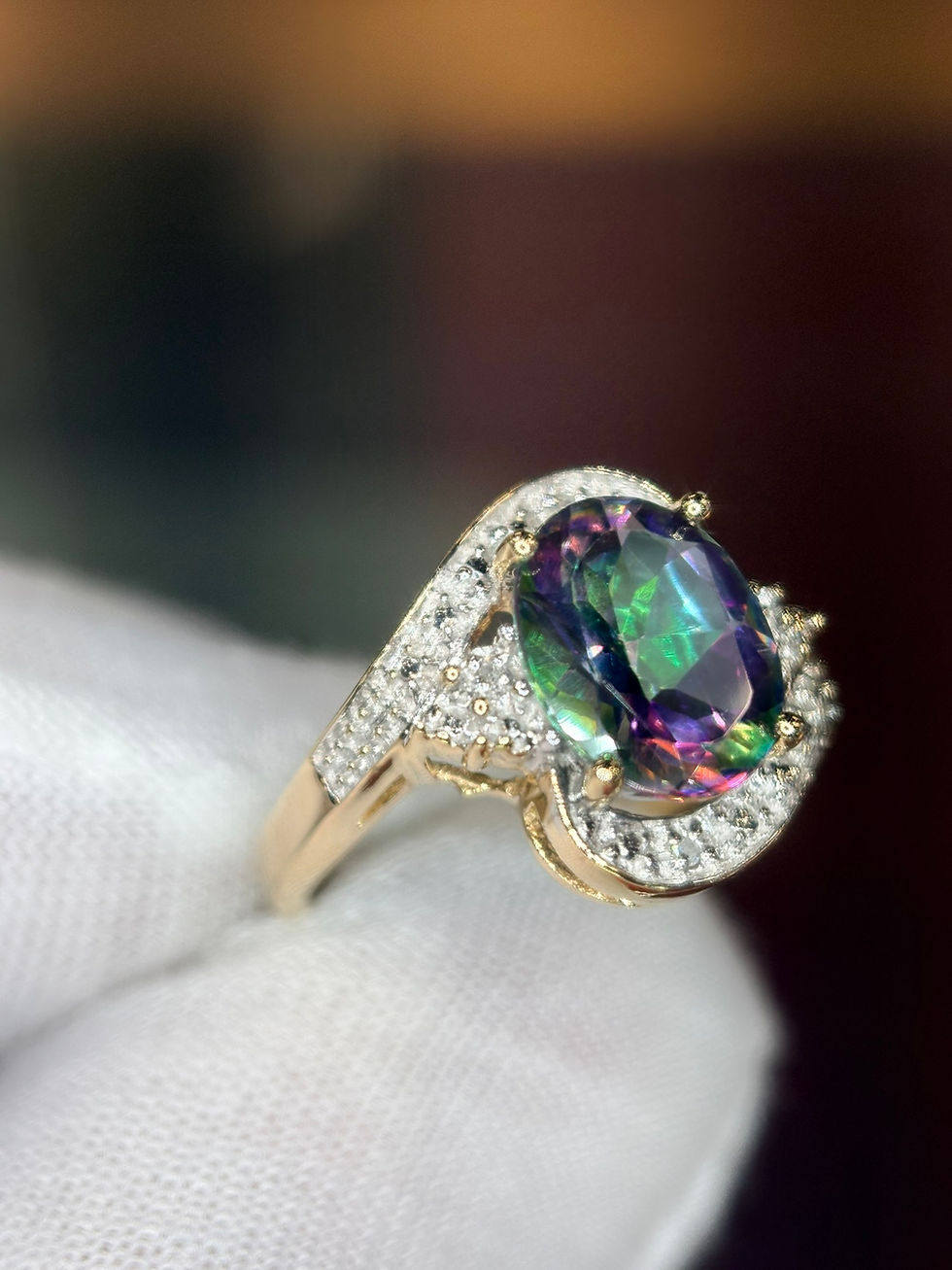 Thumbnail: Mystic topaz ring with diamond halo in 14K gold