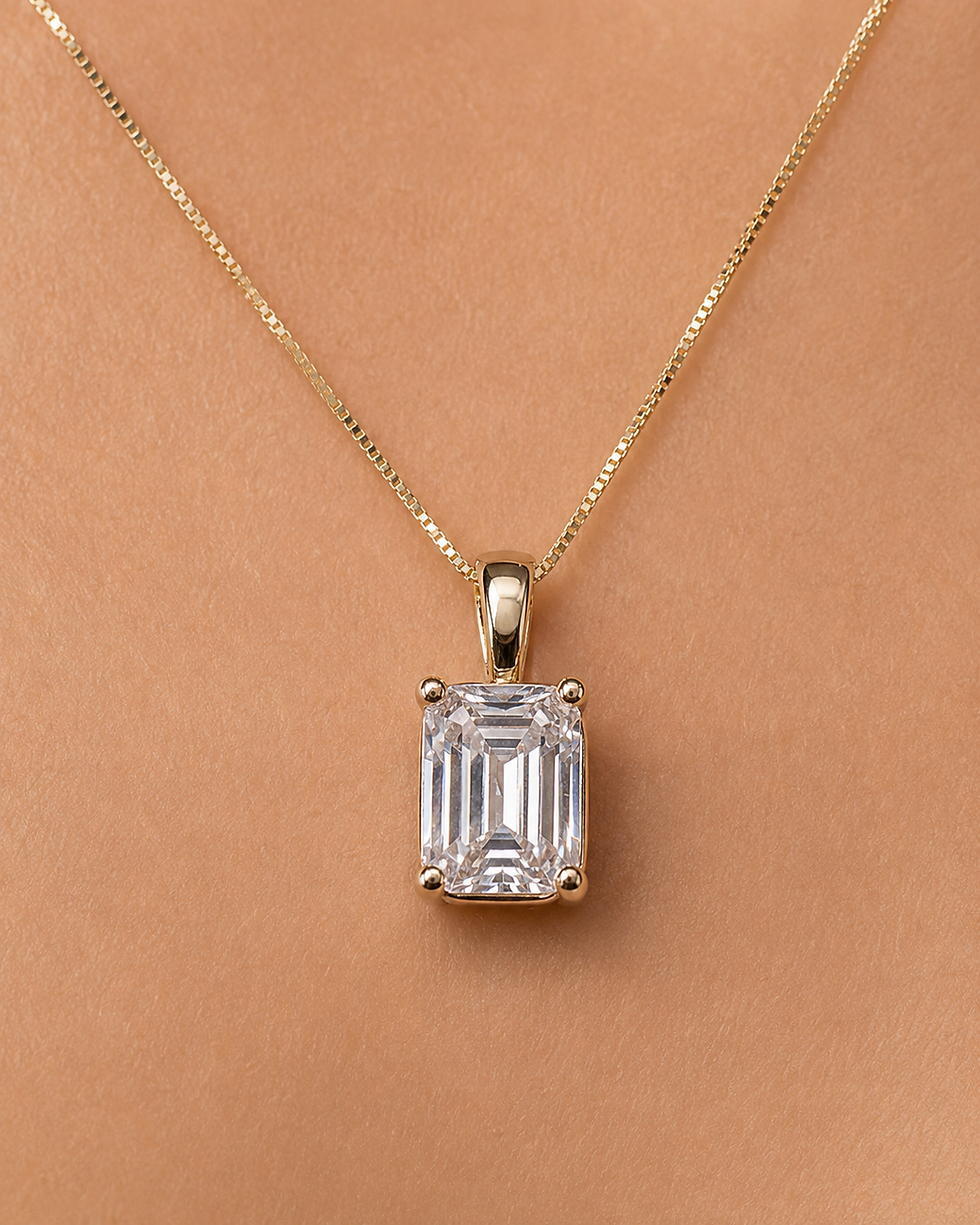 Thumbnail: Emerald cut diamond pendant necklace on gold chain