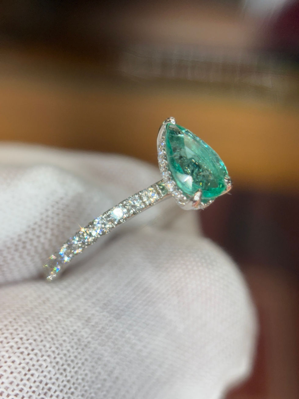 Thumbnail: Side view of 2.07ct pear-shaped sapphire and diamond ring