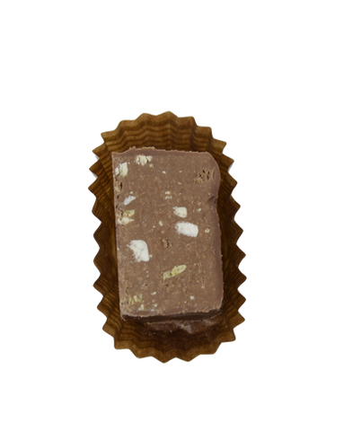 Duchesse : Ganache lait, amandes et pistaches, vanille.