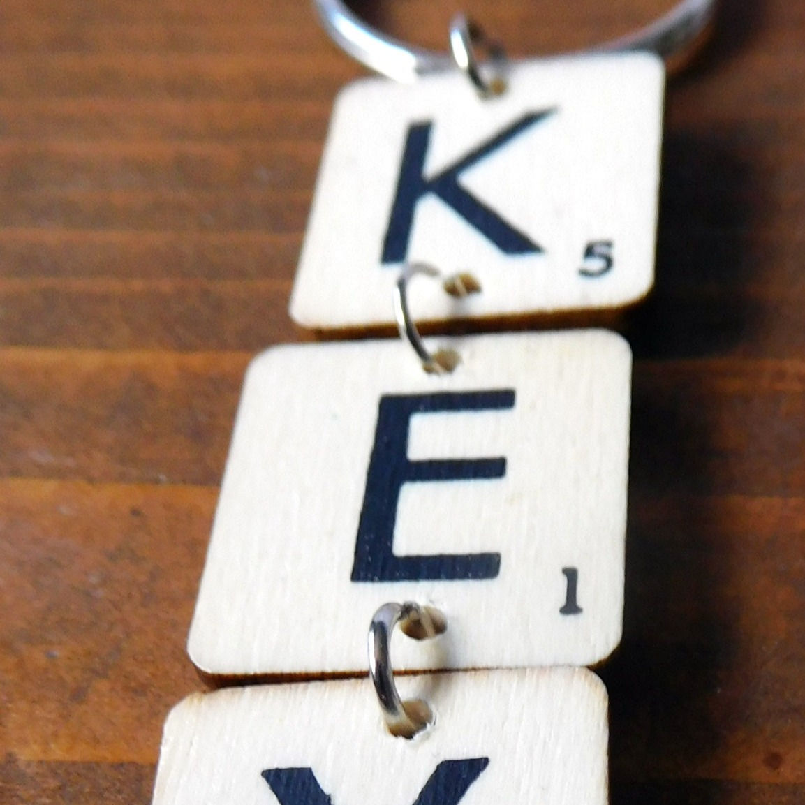 Keyring with Scrabble tiles spelling "KEY"