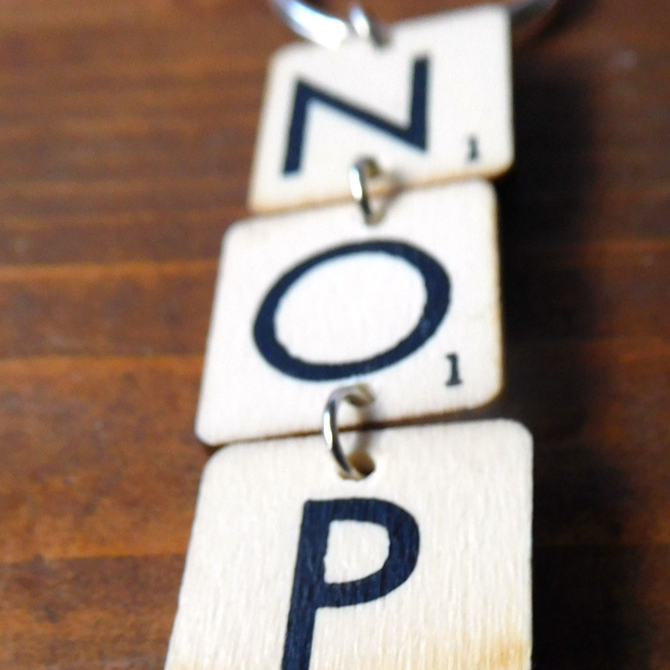 Scrabble tile keyring: NOP