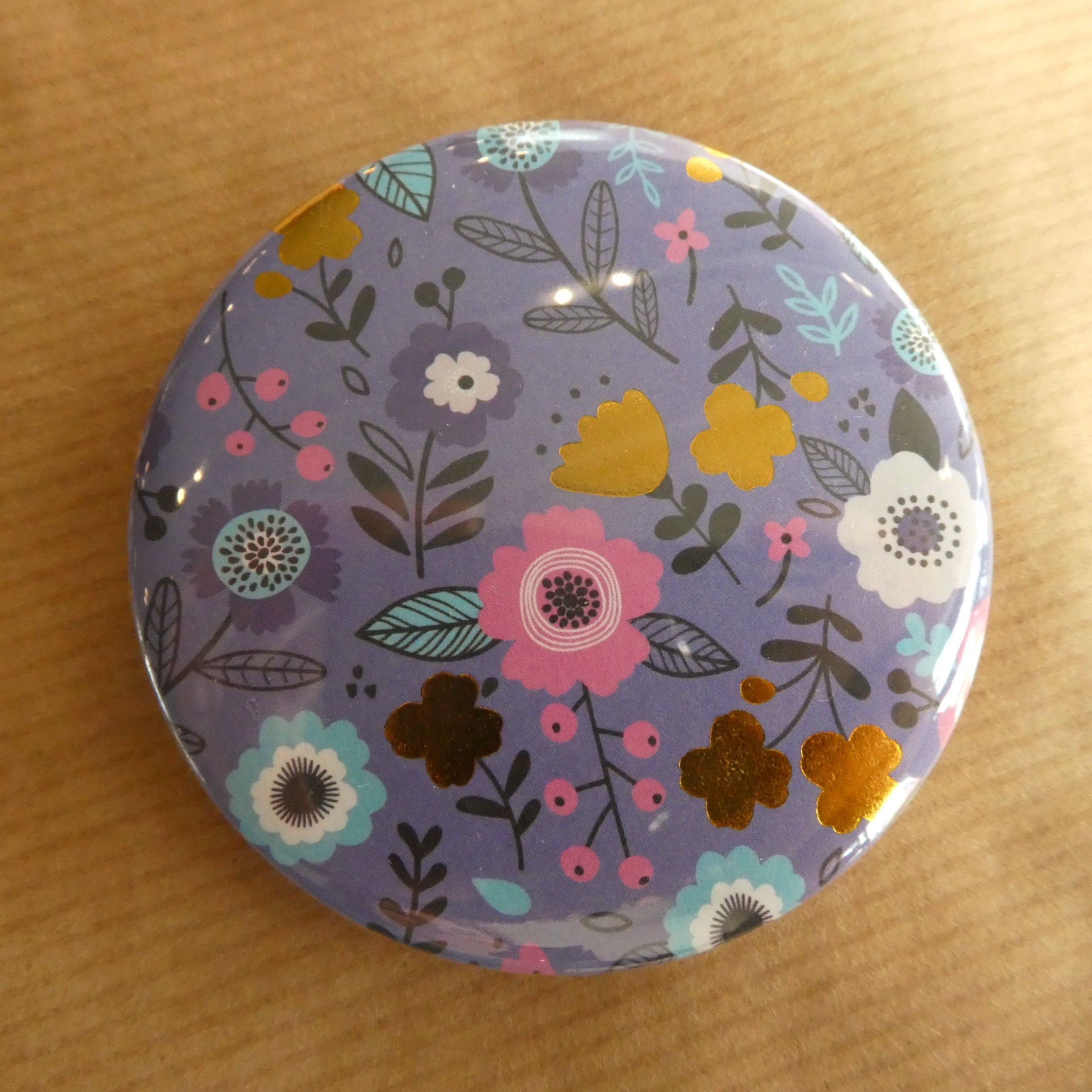 Purple floral button badge
