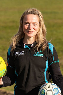 Abby SIdeline Headshot 2026.jpg