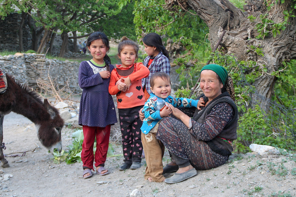 a woman and kids in Sentyab village, Nurata, Uzbekistan