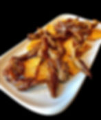 Lagartito ibérico sobre lecho de patatas fritas