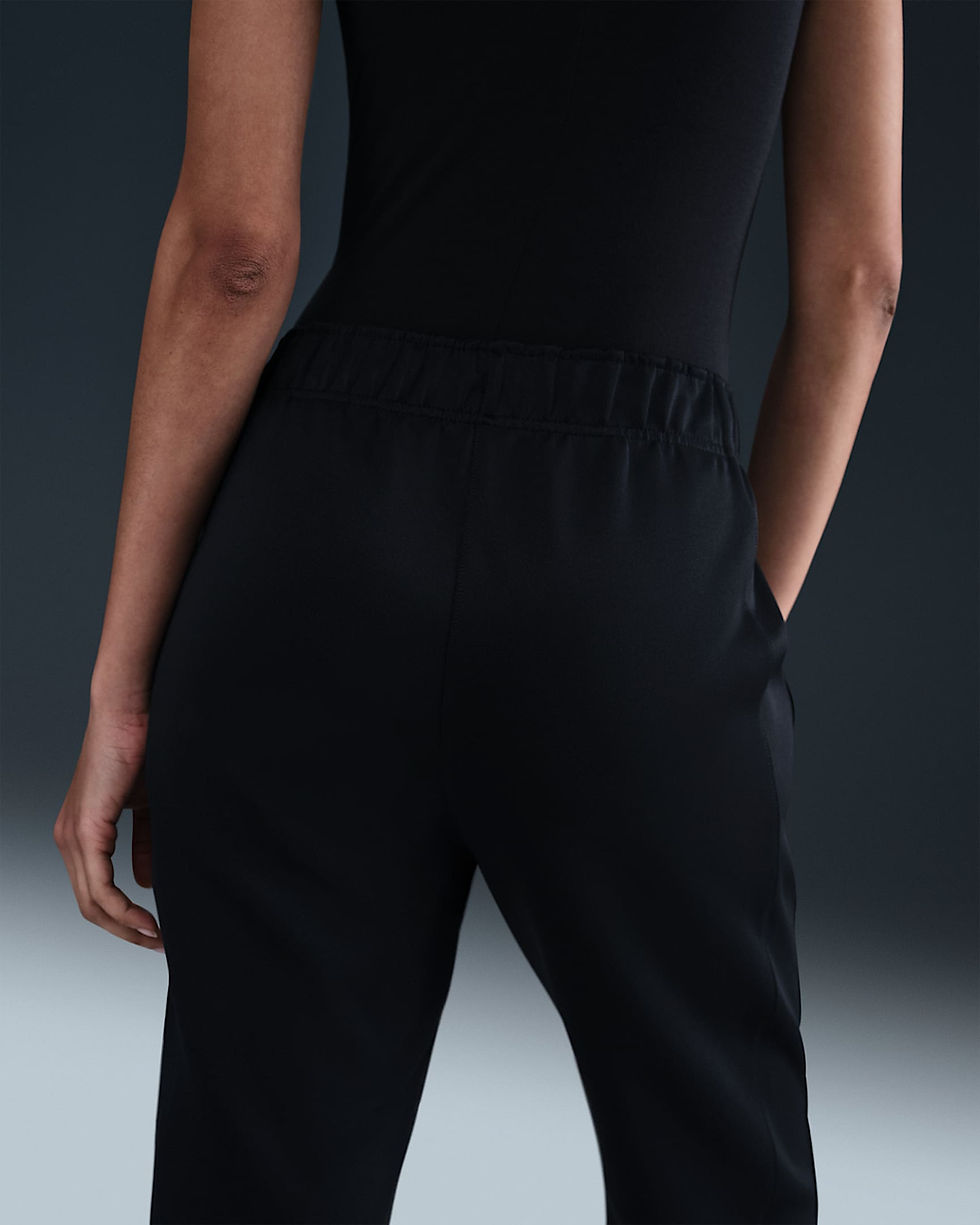 الصورة المصغرة: Nike Sportswear Windrunner Women's Mid-Rise Slim Knit Trousers