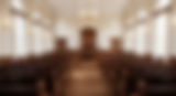 courtroom-interior-with-rows-seats-large-windows.jpg