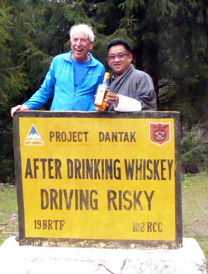 Roadside signs displaying safe driving messages.