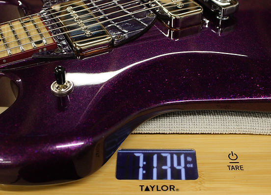 EA 24 Purple Sparkle Guitar weight on scale 7 pounds 13.4 ounces