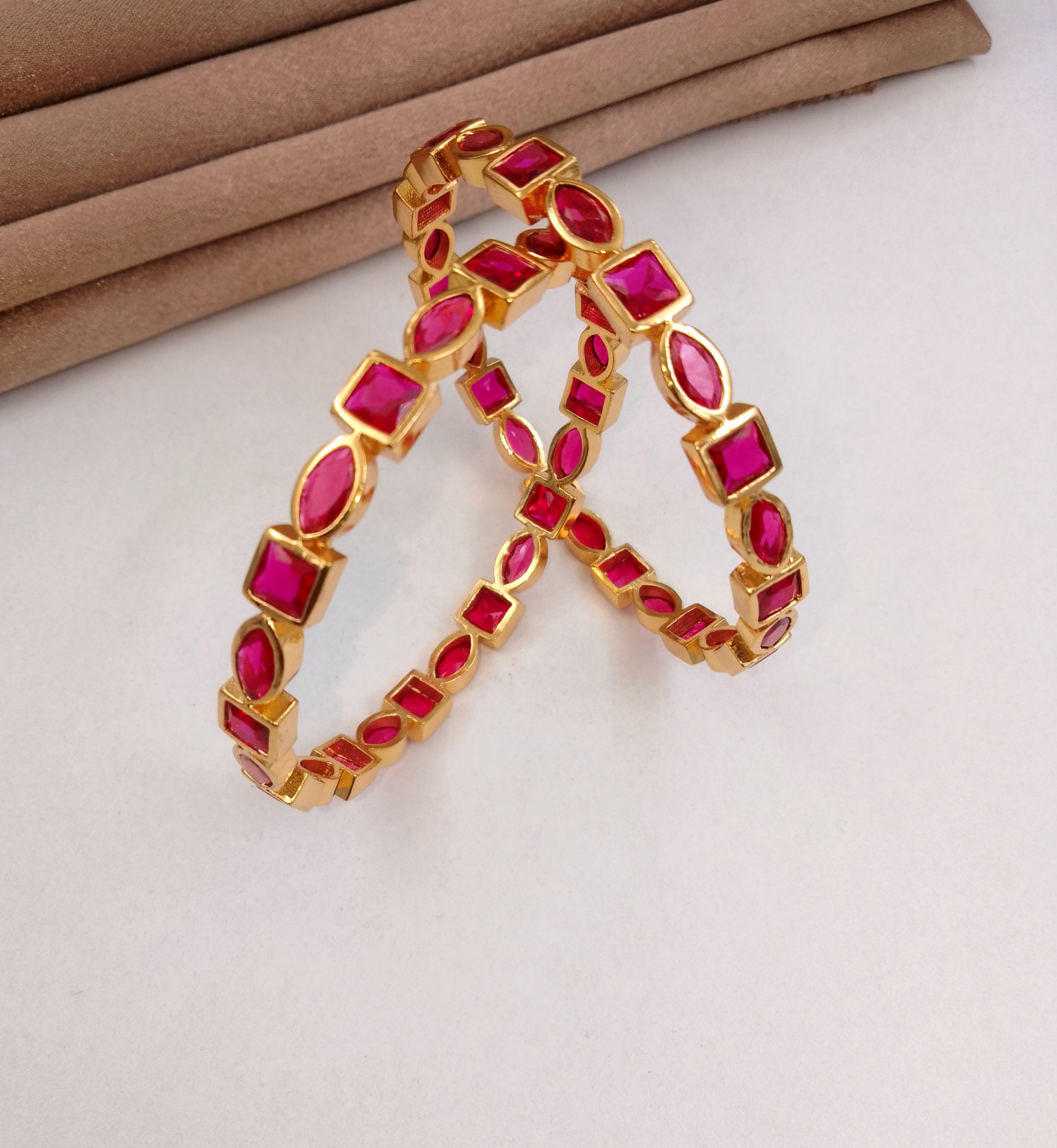 Exclusive Kemp Bangles