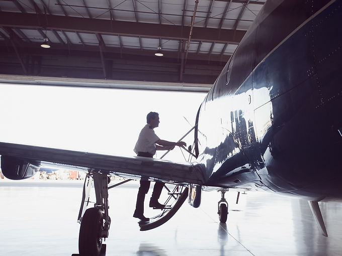 Man Boarding an Airoplane