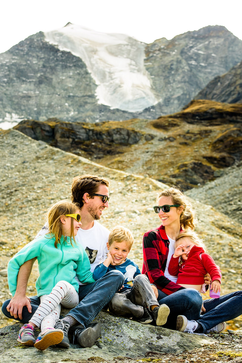 Our family in the mountains in front of a glacier