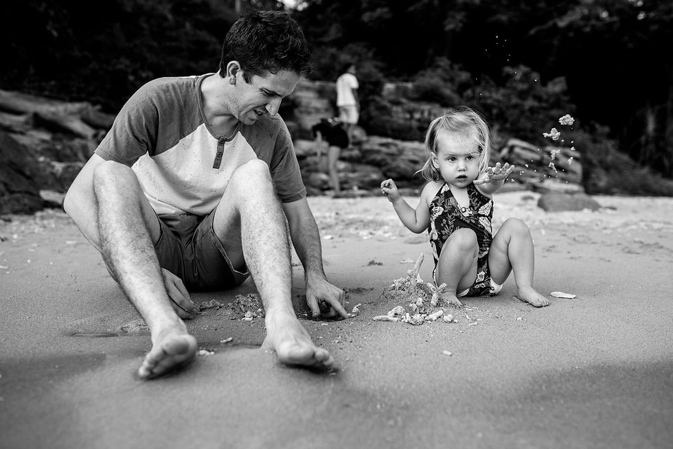 Brad and Skye play in the sand
