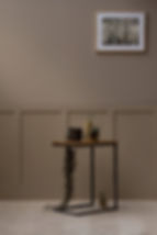 Sustainable  oak side table as a bathroom plant holder 