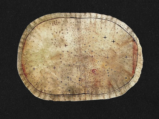 Skidi Pawnee Star Chart, also known as the Big Black Meteoric Star Bundle, made of soft leather and marked with painted stars.