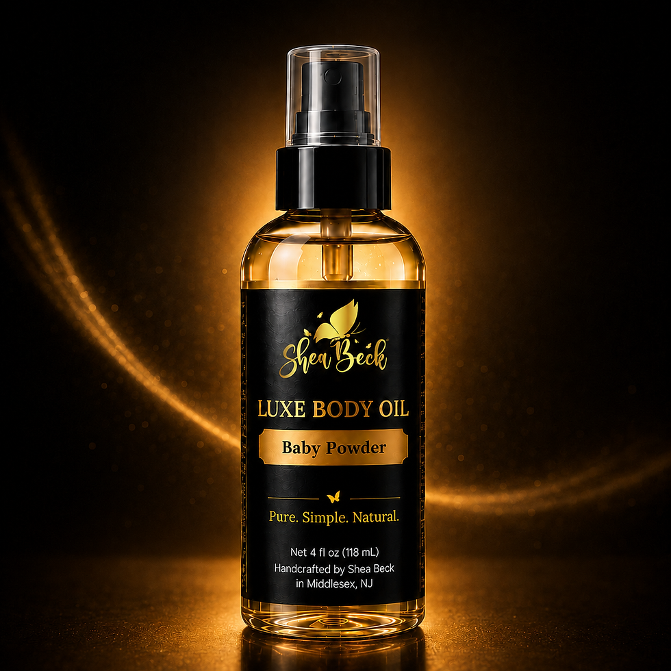 Shea Beck Luxe Baby Powder Body Oil in a 4 oz black-and-gold pump bottle with a soft, clean powder fragrance.
