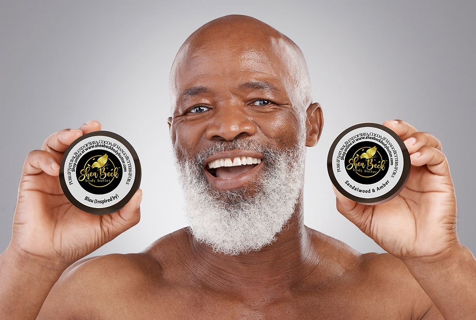 A man holding up a Shea Beck Body Butter jar