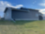 A house with open ground around it