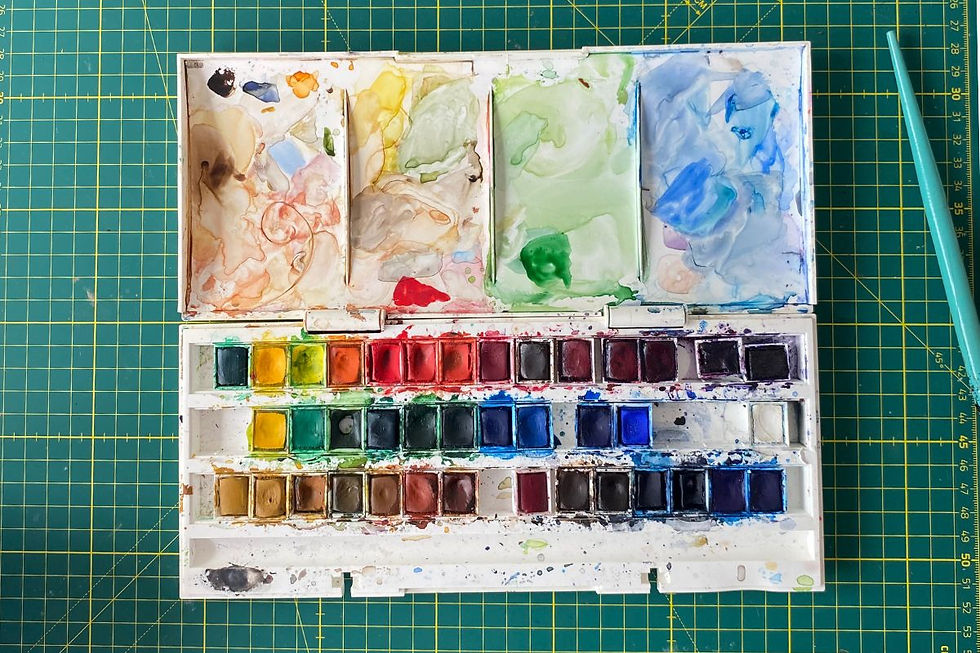 My ancient watercolour set, with some pans missing.